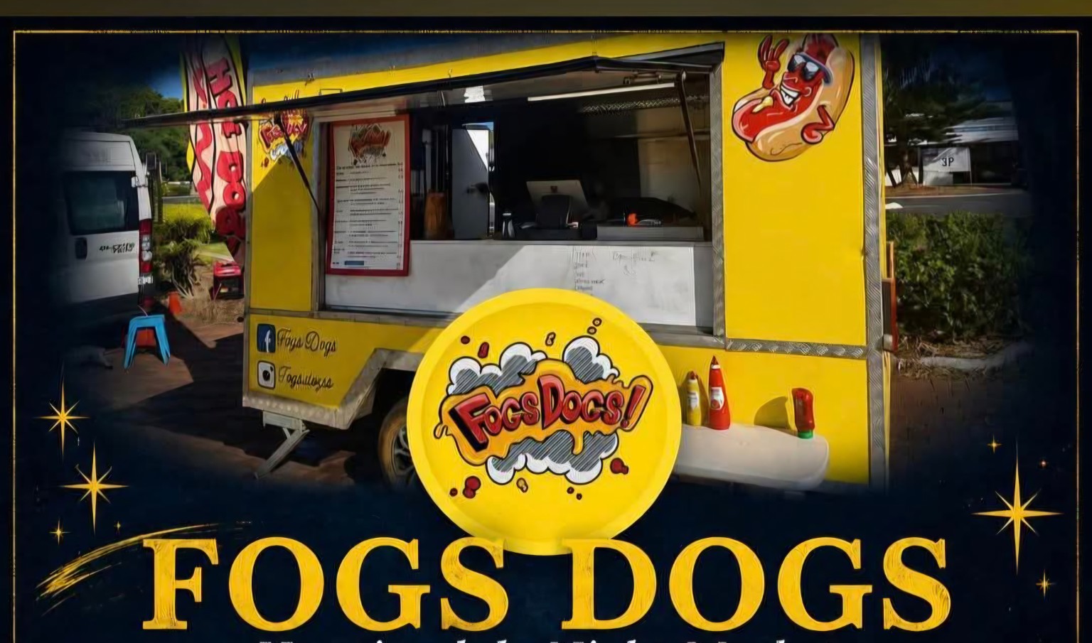 The bright yellow Fogs Dogs food trailer